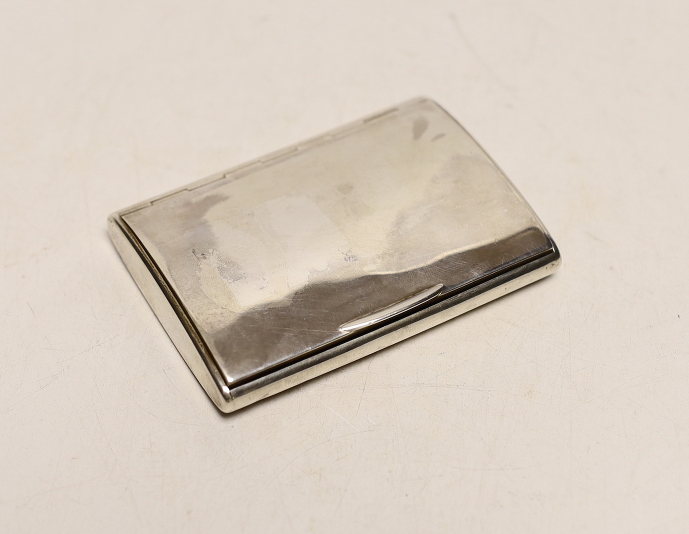 A George V silver cigarette case, Frederick Thomas Buckthorpe, London 1919, retailed by Asprey & Co, 8.5cm.